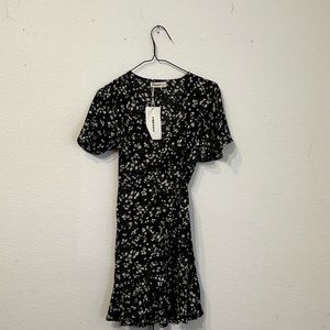 black floral mini dress with a waist tie size xs